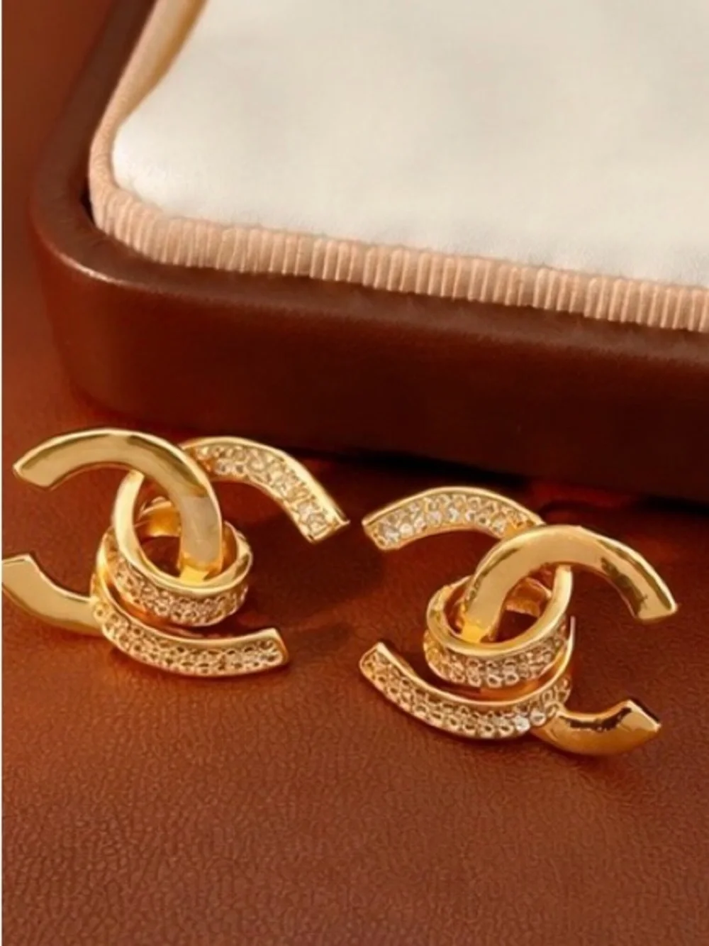 Gold Interlocking Crystal Stud Earrings – Elegant Luxury Statement Earrings